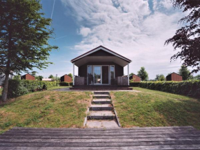 Beautiful holiday home with a veranda and jetty